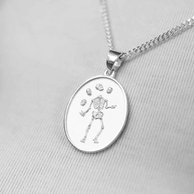 Juggling With Death Necklace